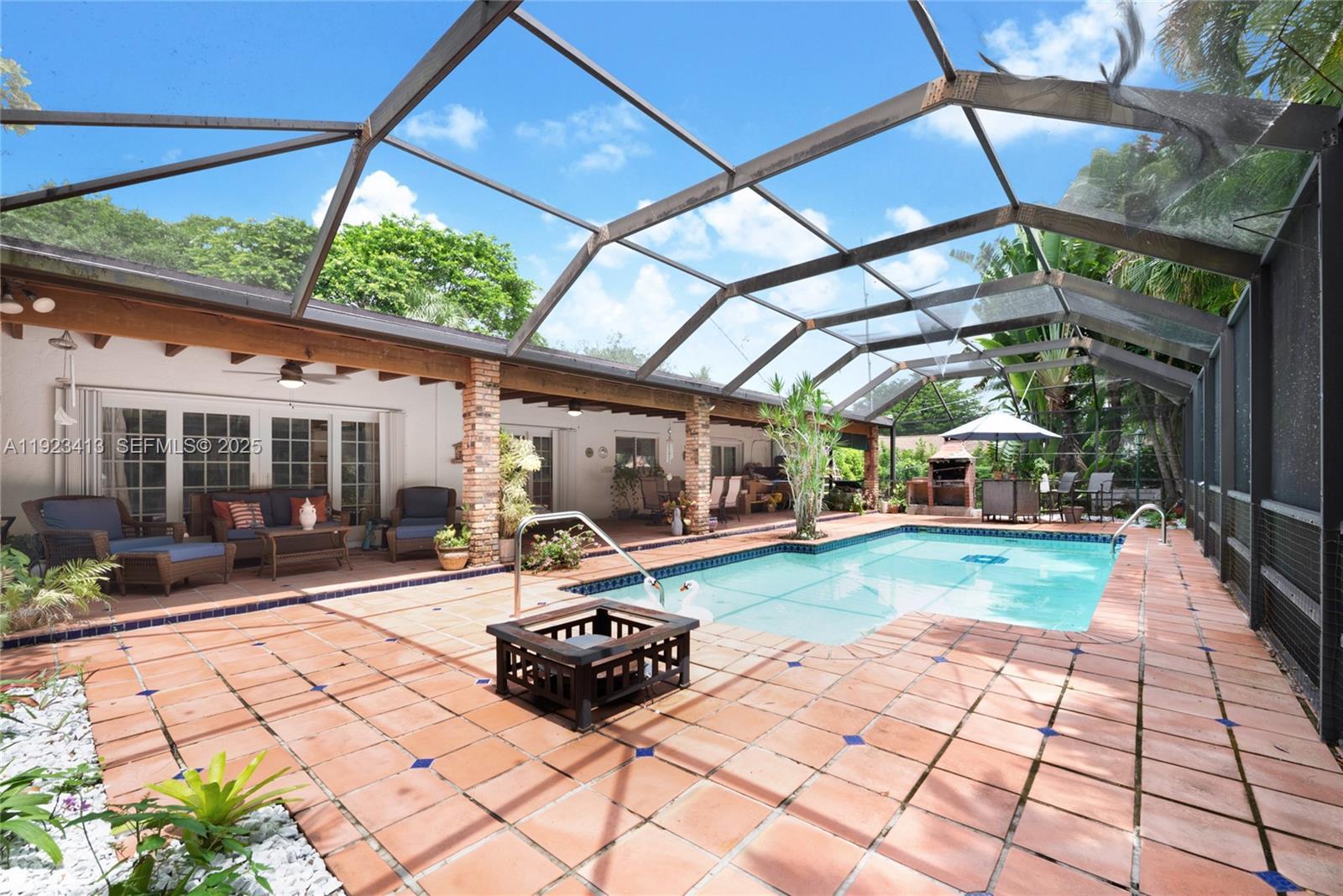 Image 4: screened pool and patio