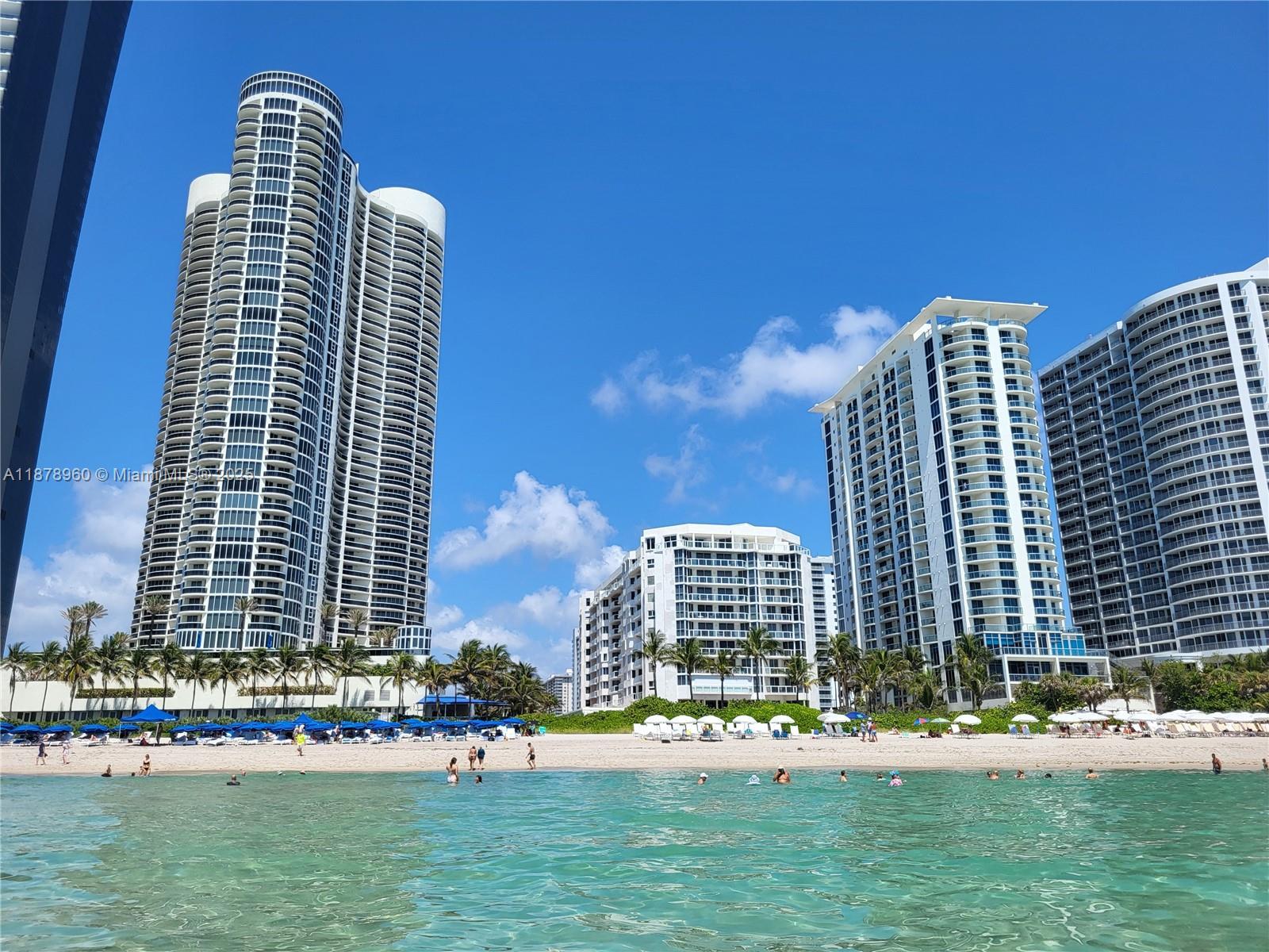 Image 2: view from standing inside the water facing the shoreline