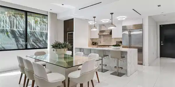 Image 4: Designed for both effortless living and serious entertaining, this open-concept kitchen is outfitted