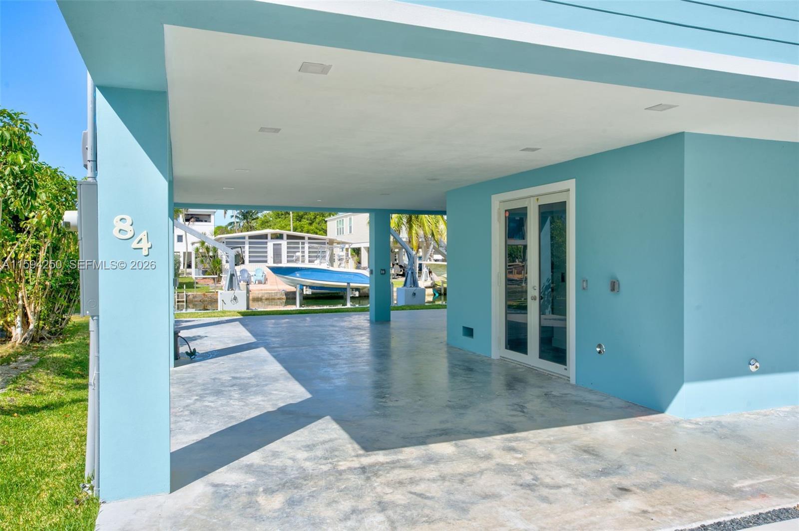 Image 4: Carport and Entry.