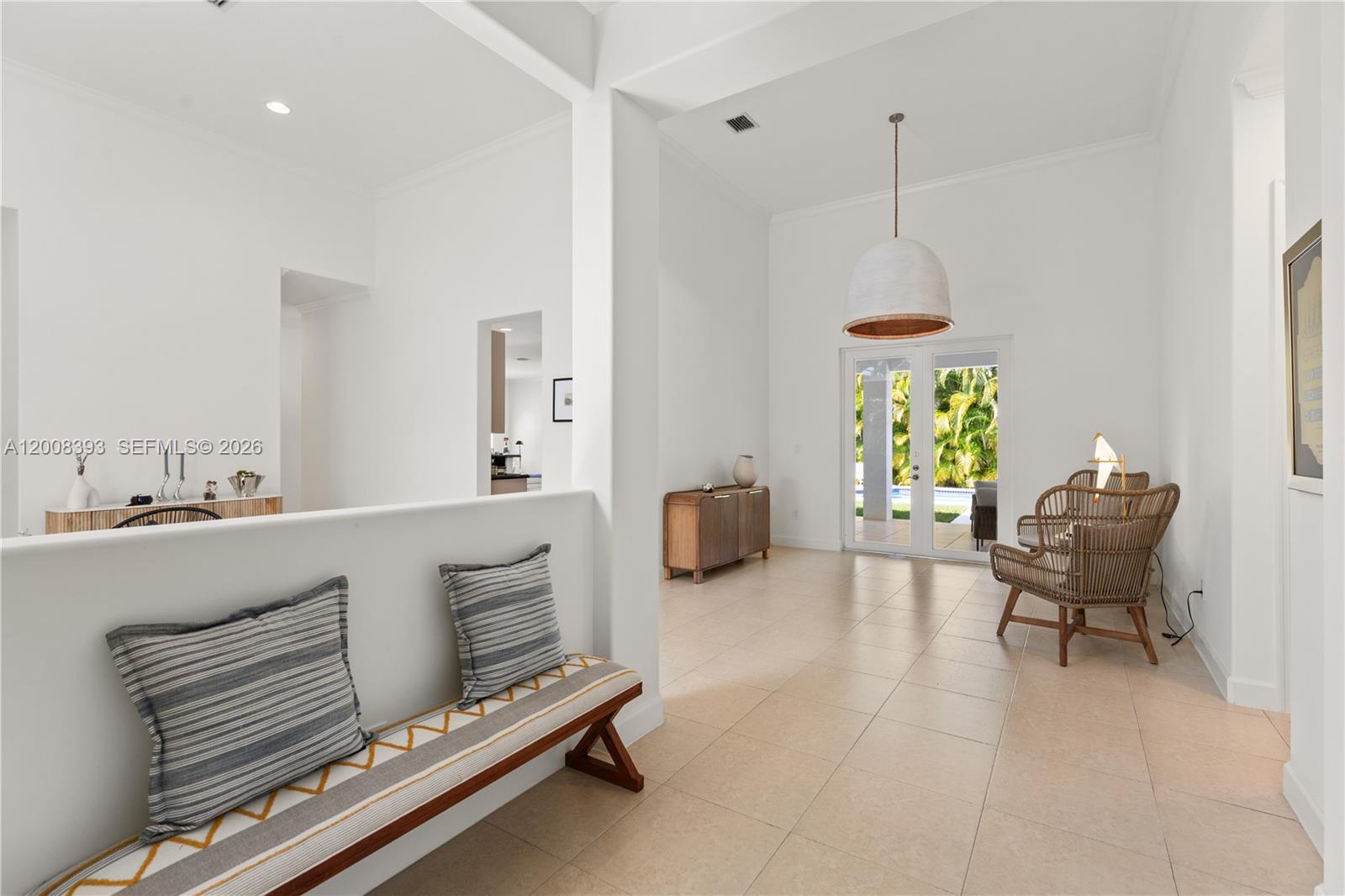 Image 3: Foyer and Dining room