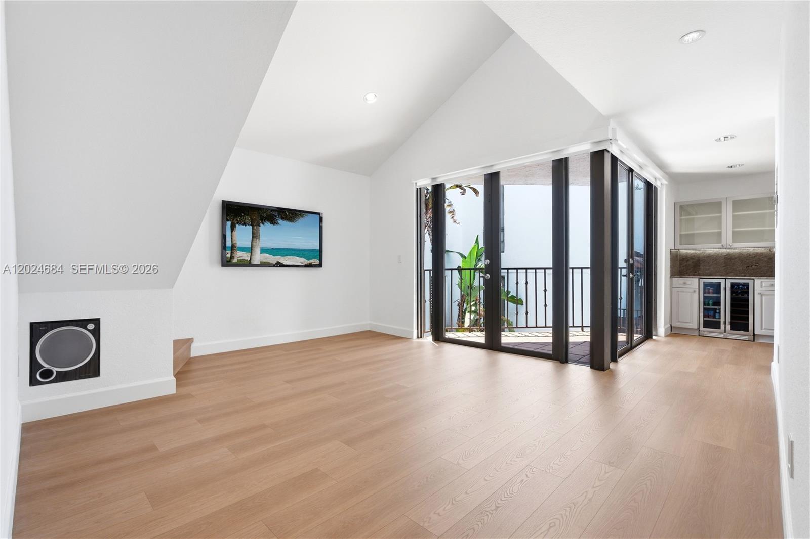 Image 2: 17 ft. vaulted ceilings, Loft above.