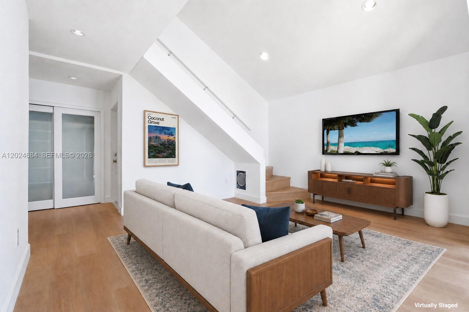 Image 3: Sofa in this location leaves a hallway to Kitchen