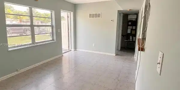 Image 2: Living/Dining Room Combination