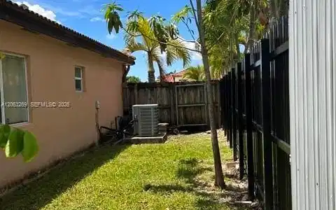 Image 2: Left Side of the House