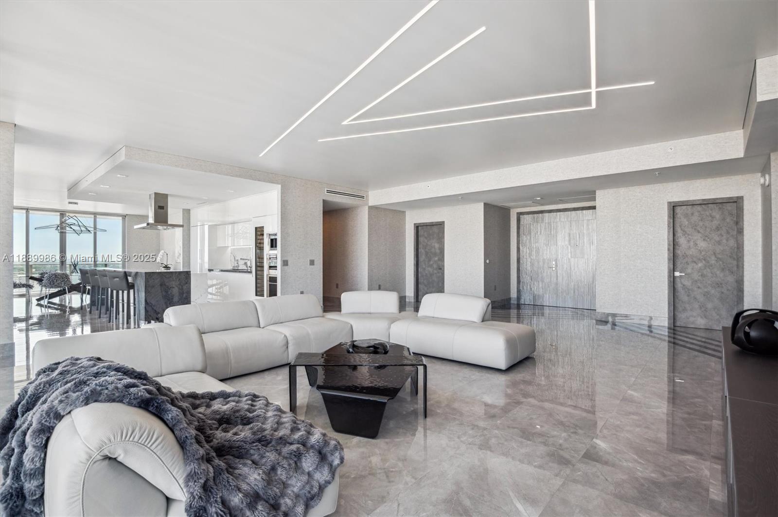Image 4: - Open Layout Living / Kitchen / Dining Areas. Detailed Stretch Ceiling w/ Custom Linear LED Lightin