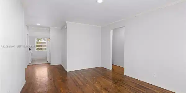Image 3: AI-modified image. Furniture digitally removed