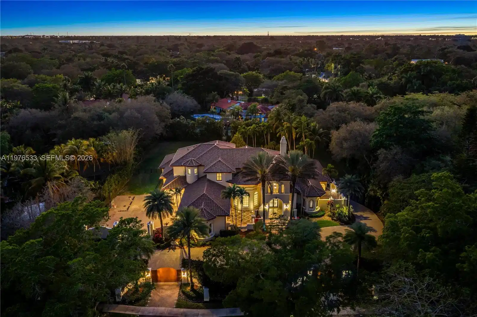 Image 1: Beautiful landscape lighting that creates a stunning ambiance at sundown