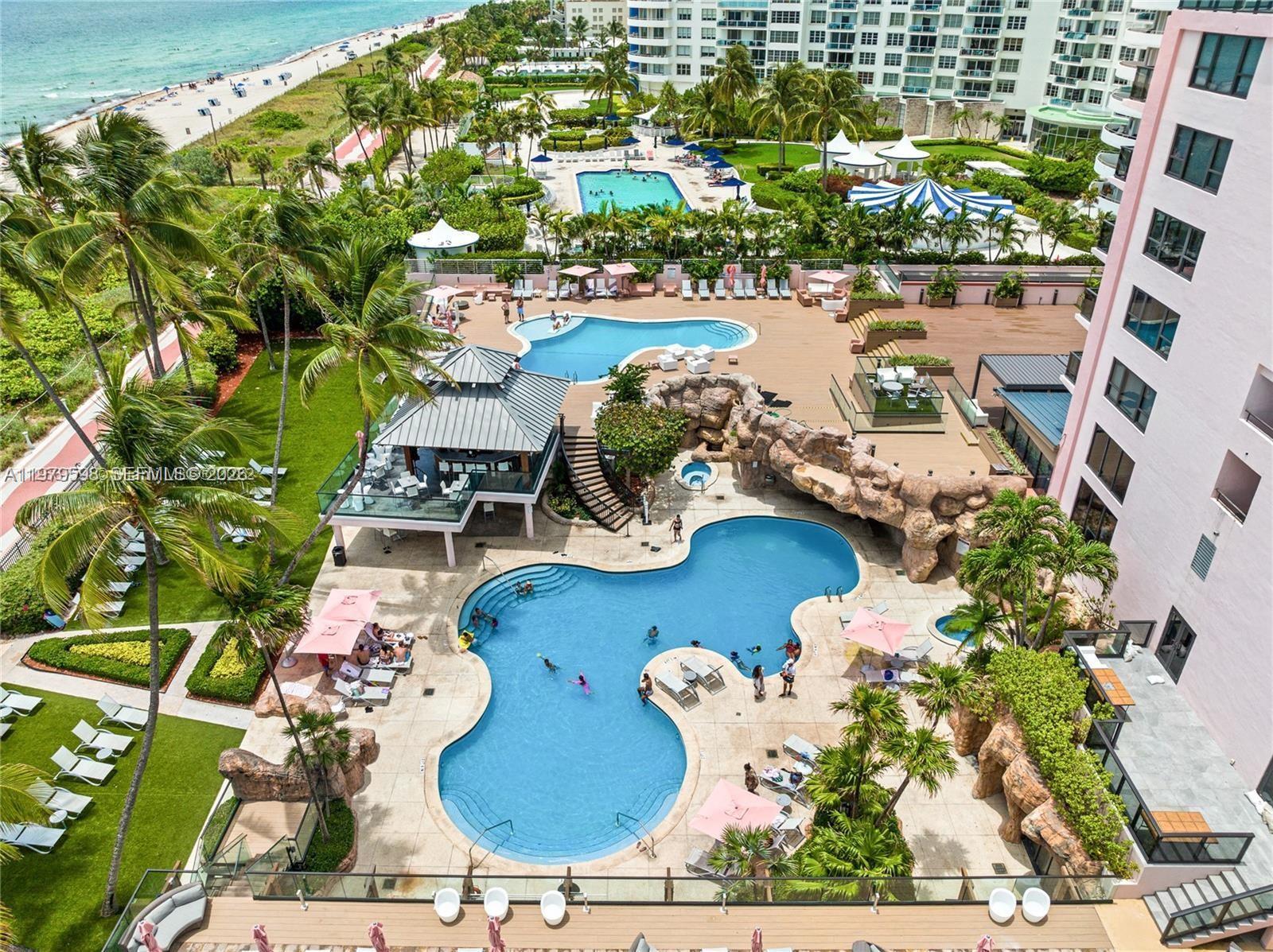 Image 1: Two swimming pools