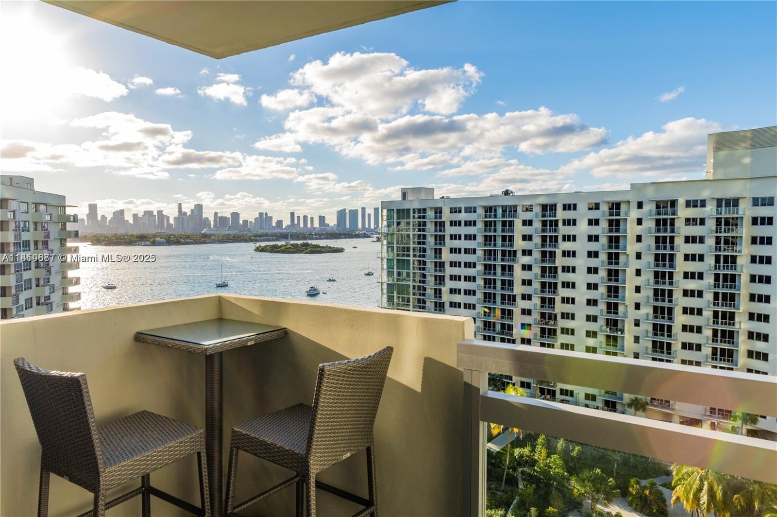 Image 1: Bay & Skyline View