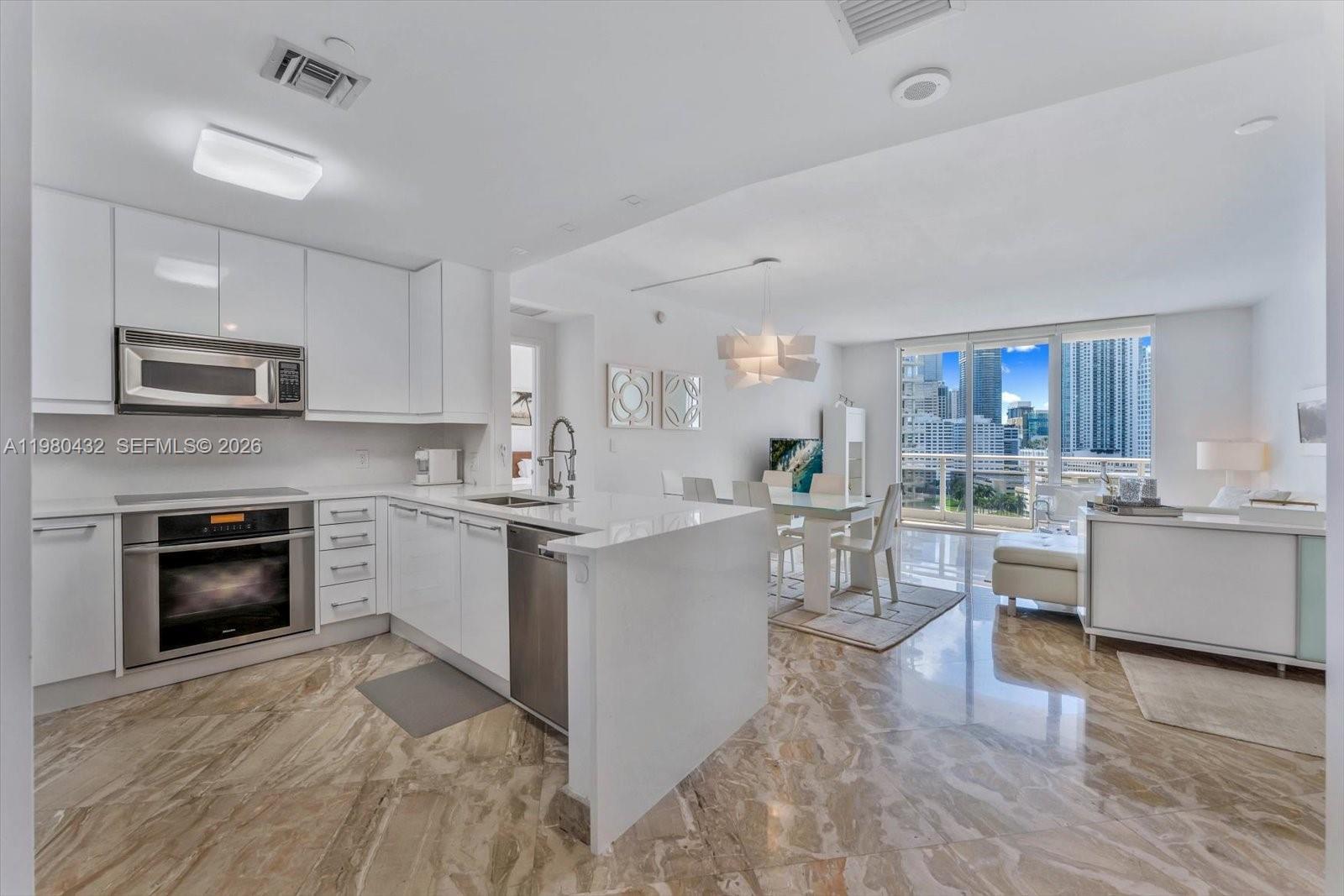Image 2: Kitchen/Dining Area