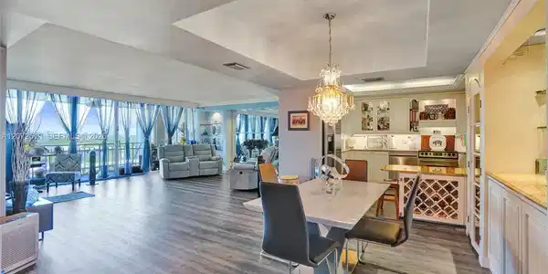 Image 2: Spacious dining room open to kitchen and living room