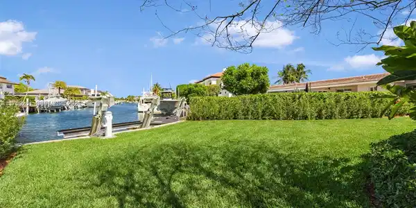 Image 3: Waterfront manicured back yard