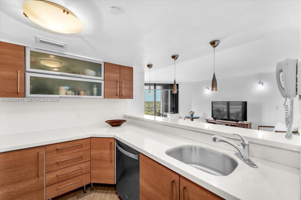 Image 2: Experience the charm of a beautifully renovated open kitchen, perfect for entertaining friends and w