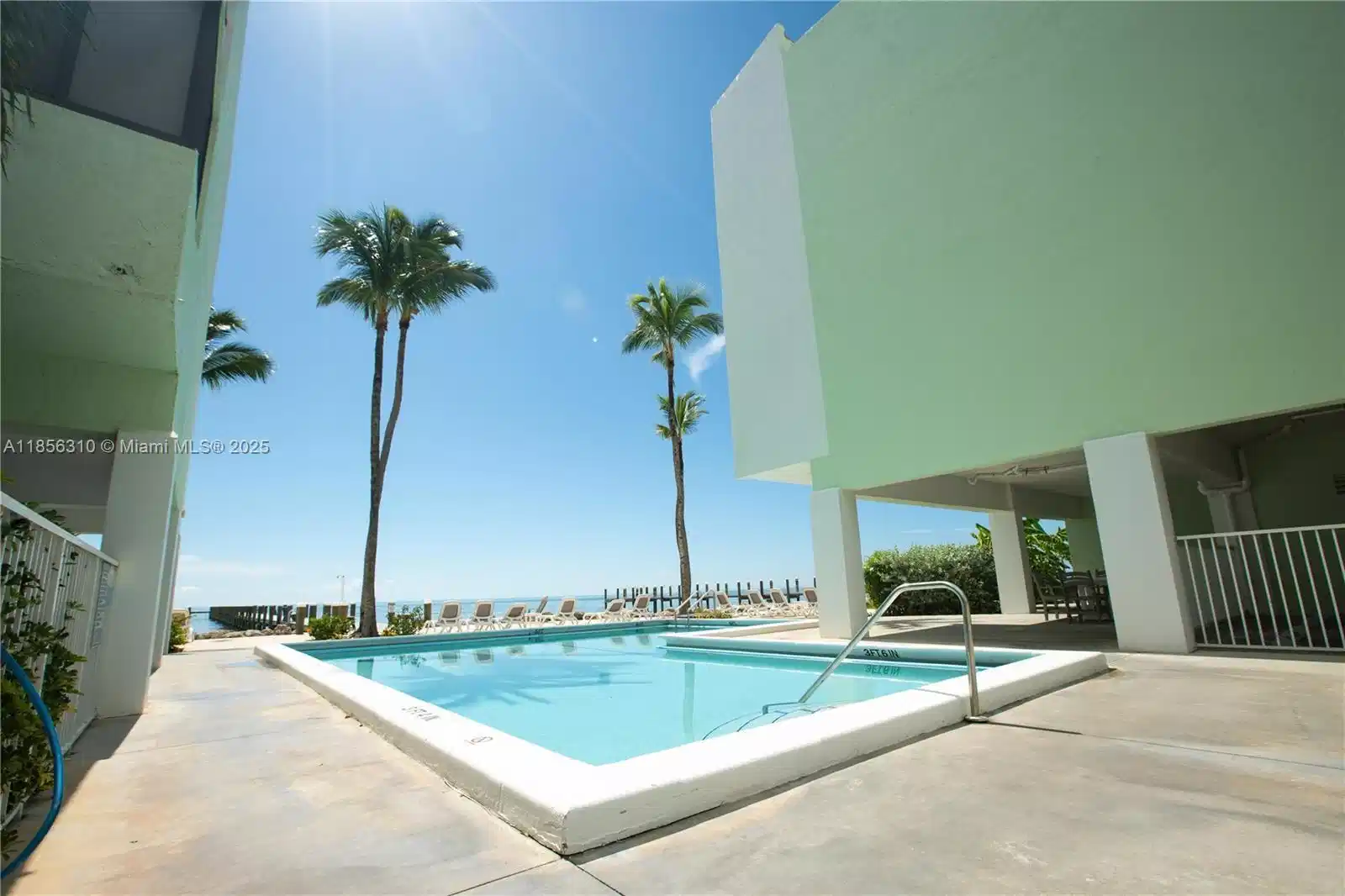 Image 1: HEATED POOL WITH 300 FT DOCK OCEANFRONT