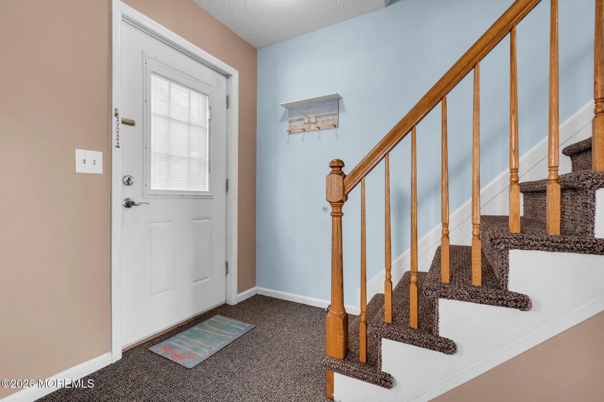 Image 4: Front Door & Staircase