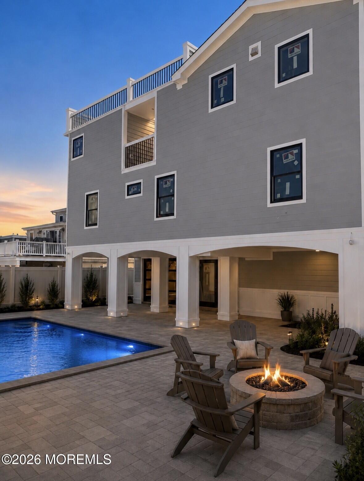 Image 3: Backyard with fire pit