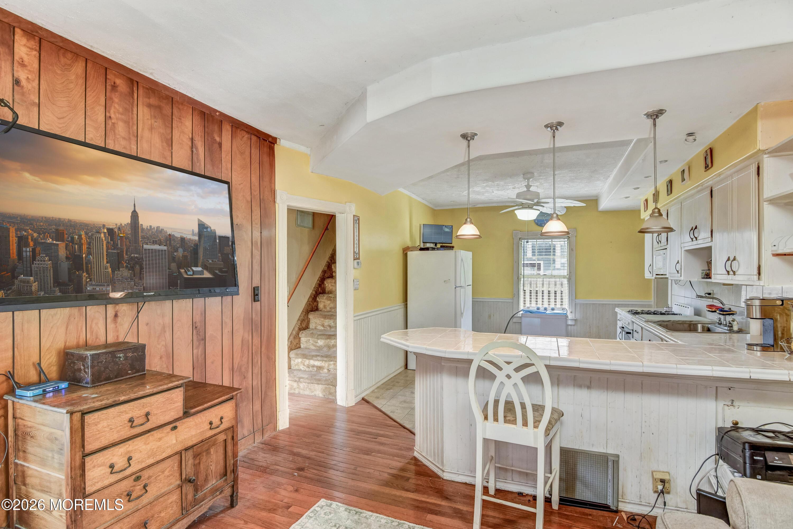 Image 1: Family Room and kitchen