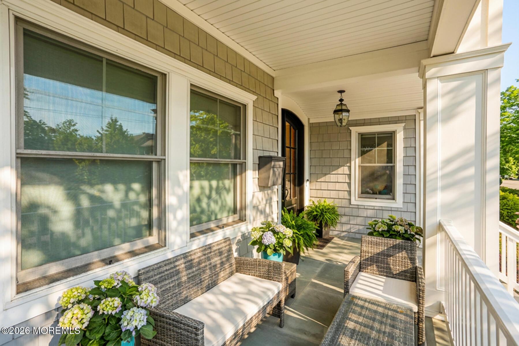 Image 4: Blue Stone Covered Front Porch