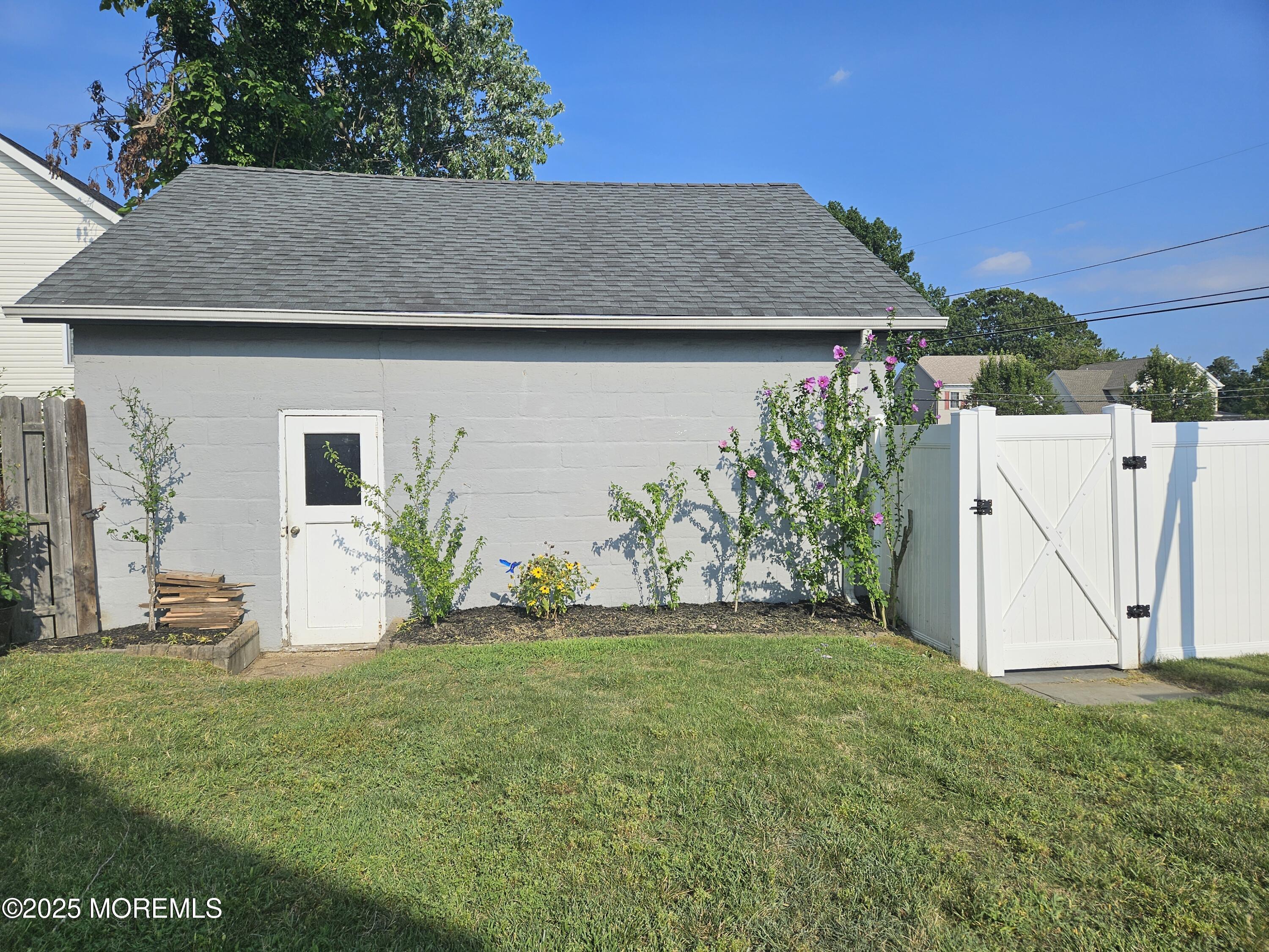 Image 4: side door to Garage