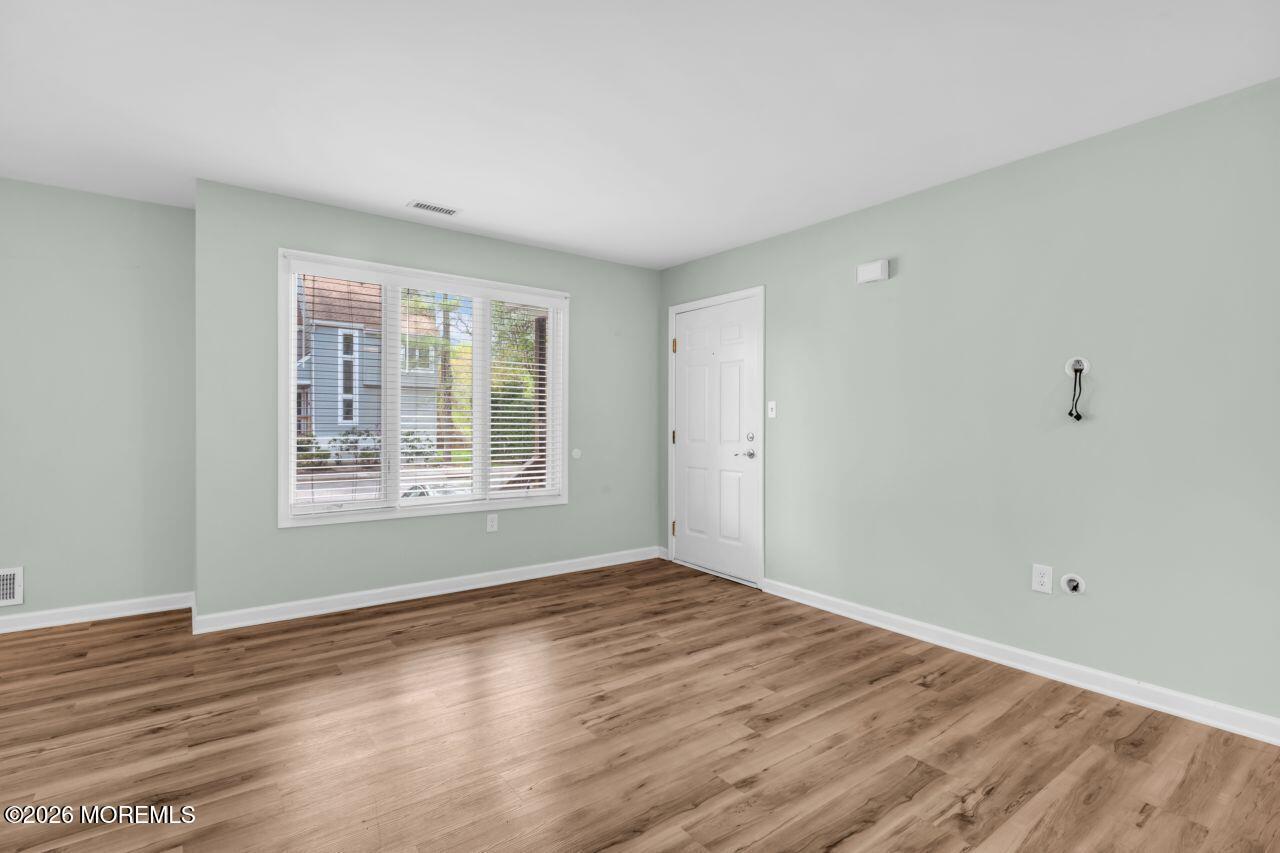 Image 2: Front Door/Living Room