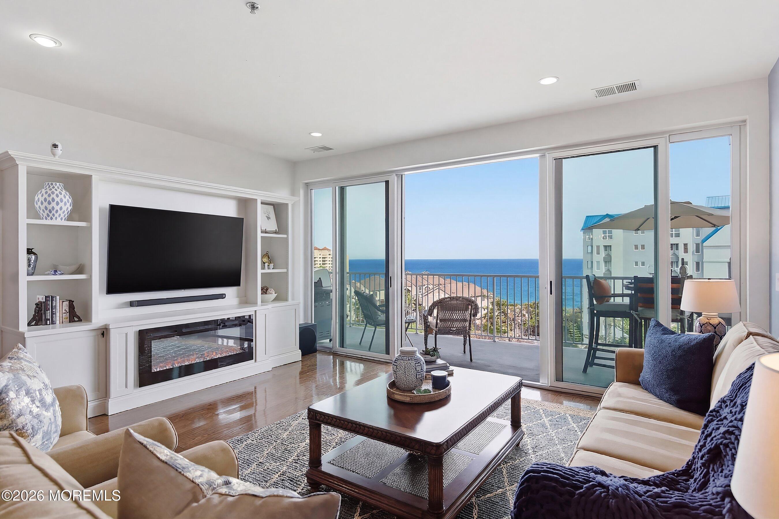 Image 3: Living Room with Waterviews