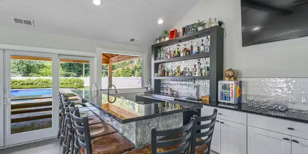 Image 3: Bar has a balcony to the outside