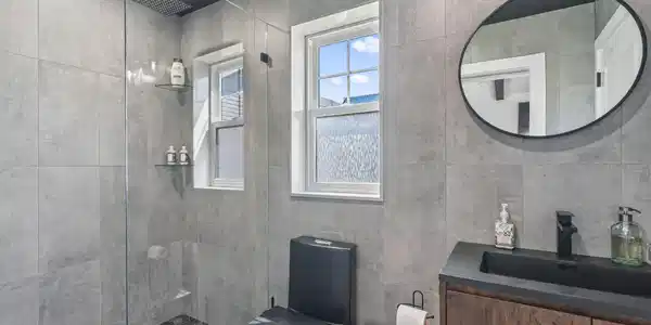 Image 4: Cabana full bath with door to the pool