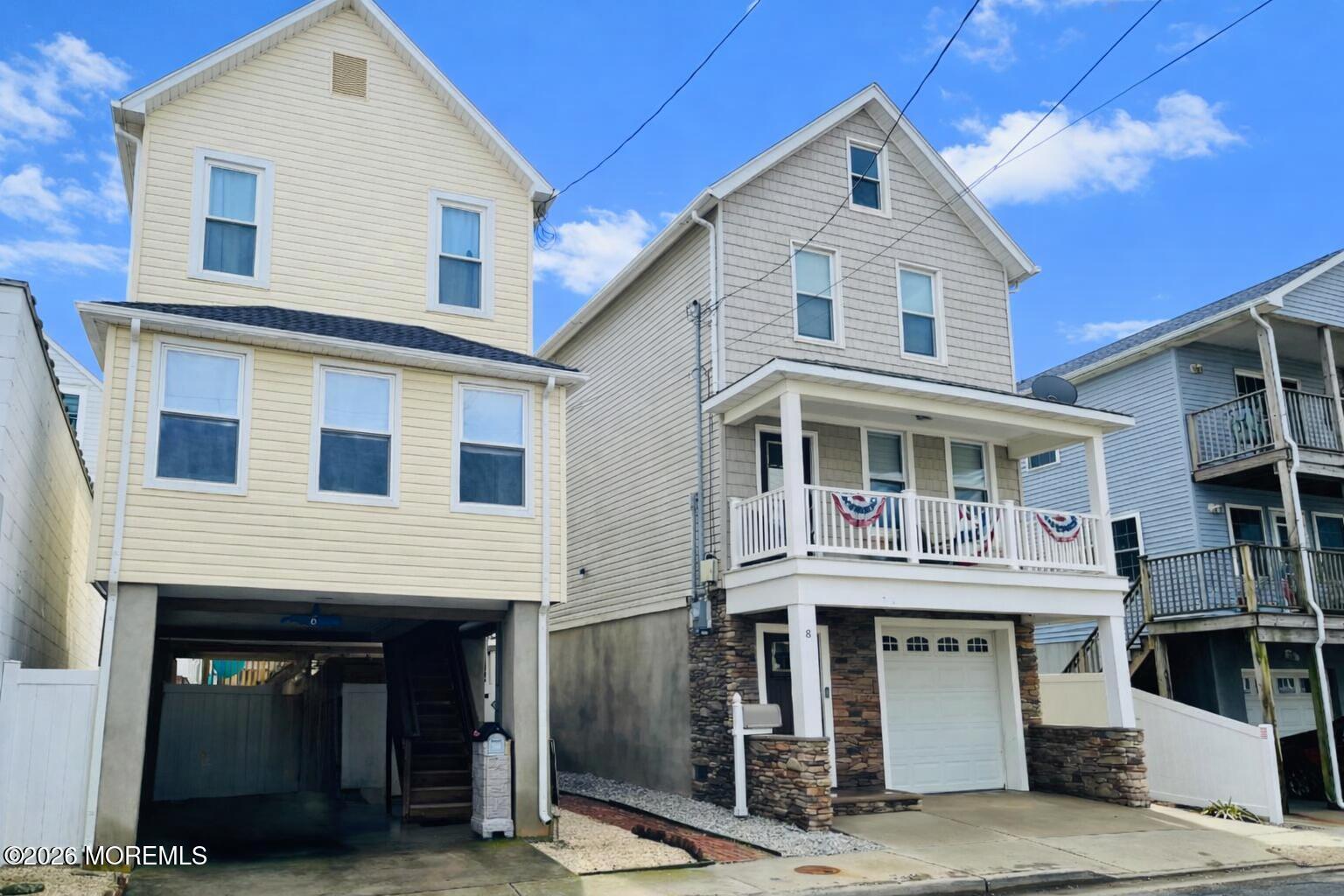 Image 1: Front of House with sky