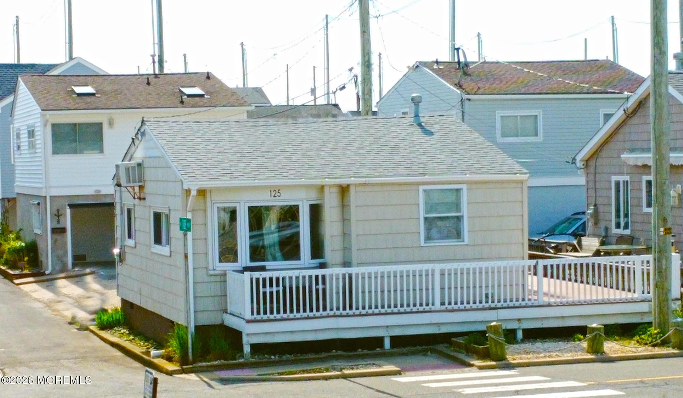 Image 2: 125 W Tide (1)