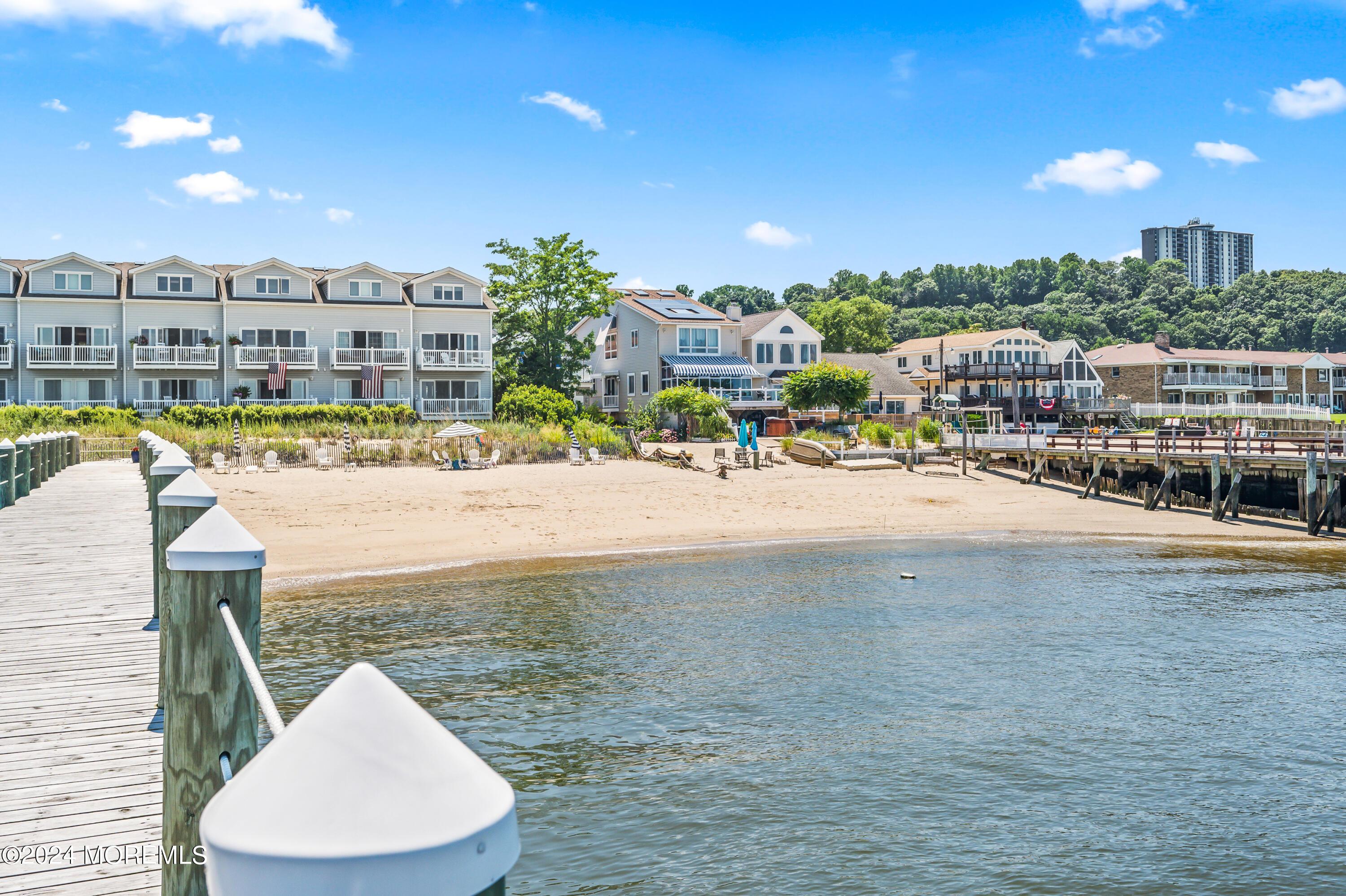 Image 2: Private Beach and Dock