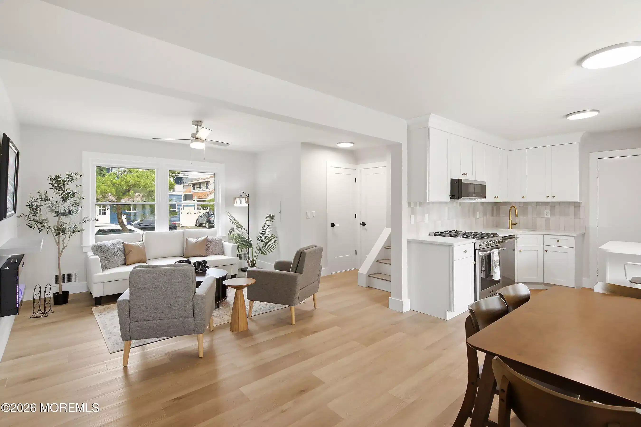 Image 1: Dining to Living and Kitchen