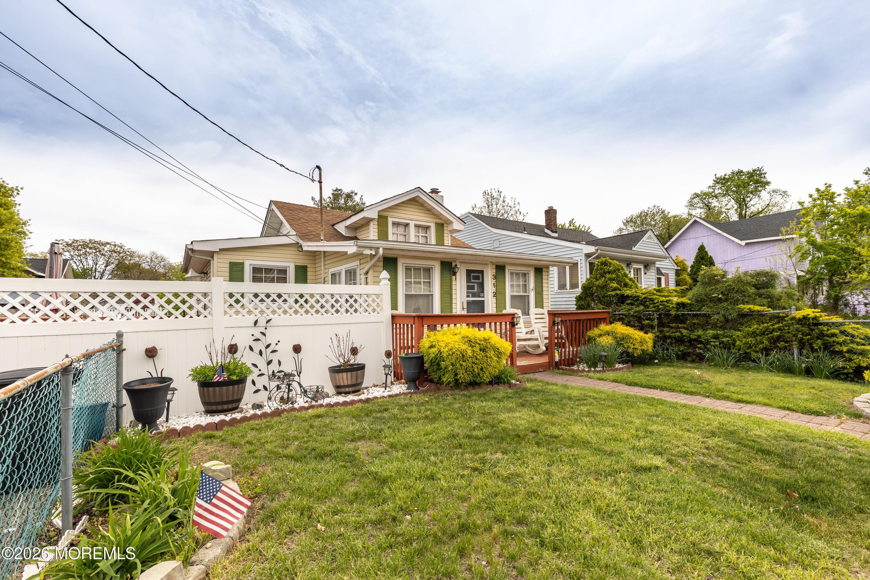 Image 2: Welcome home to 312 Elmwood Drive
