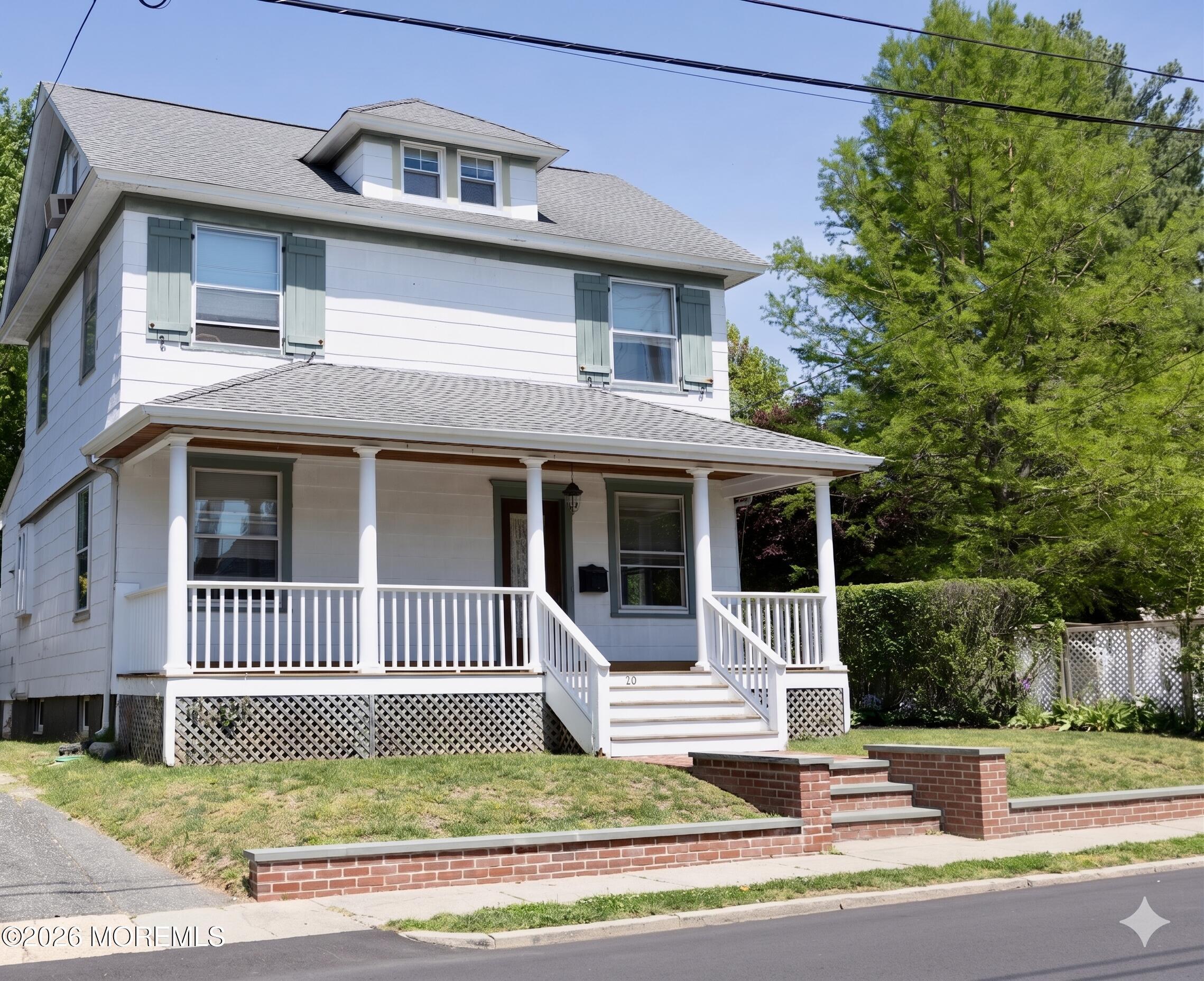 Image 1: brownfront of house updated
