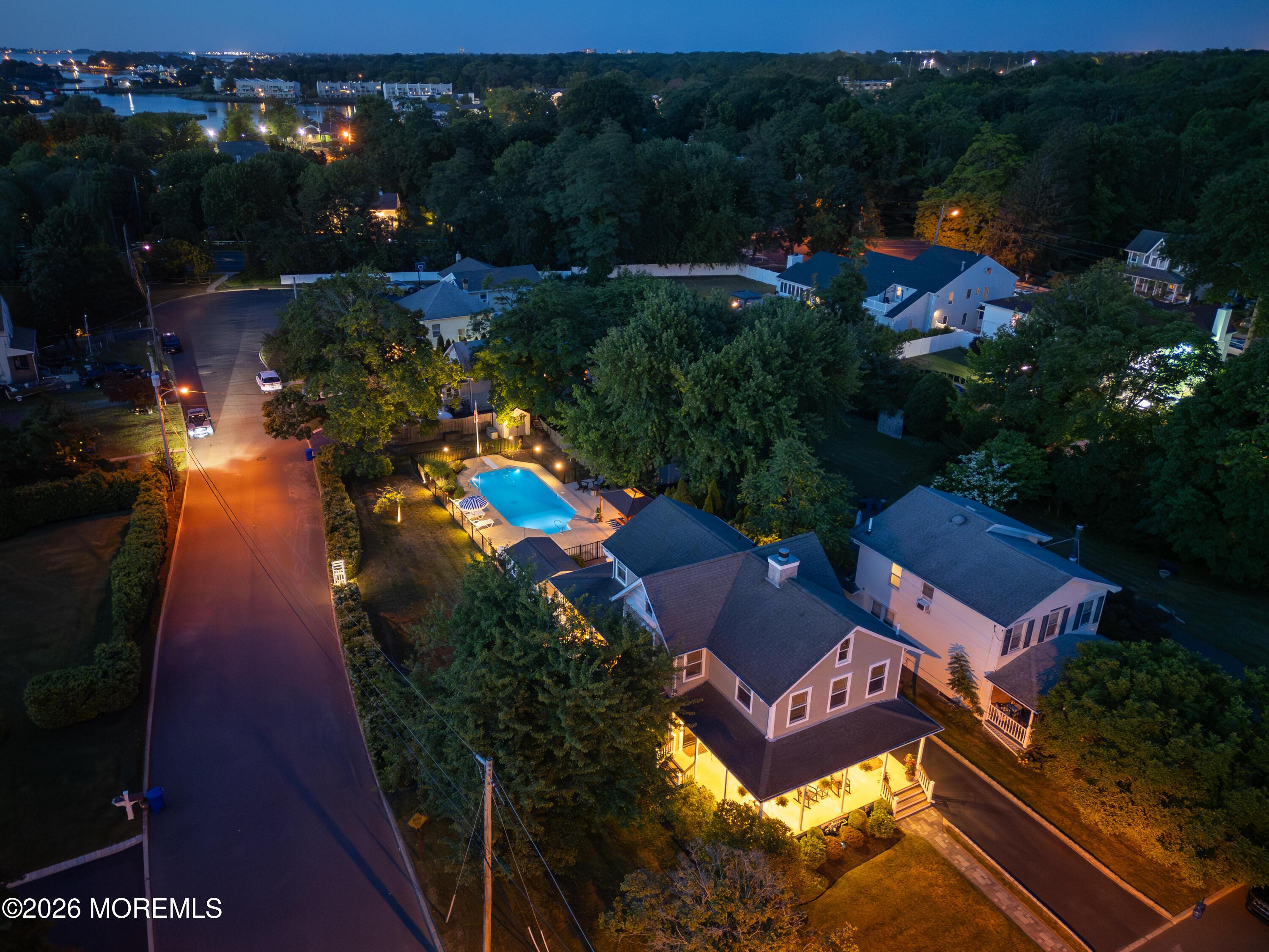 Image 3: Corner lot at dusk