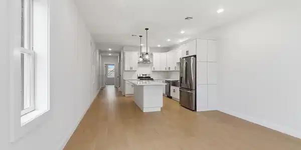 Image 2: Living Room to Kitchen
