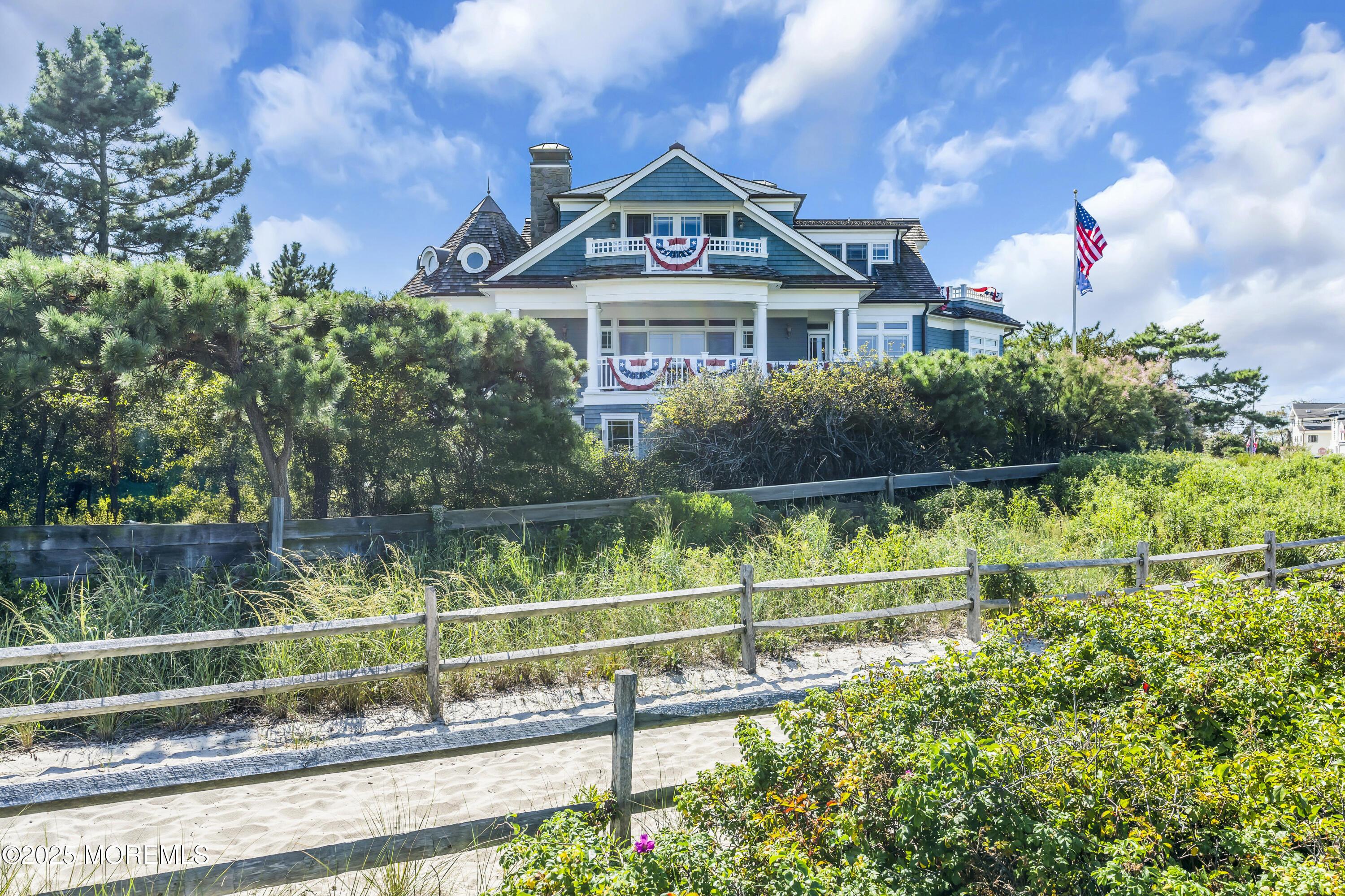 Image 1: Beachfront Oasis