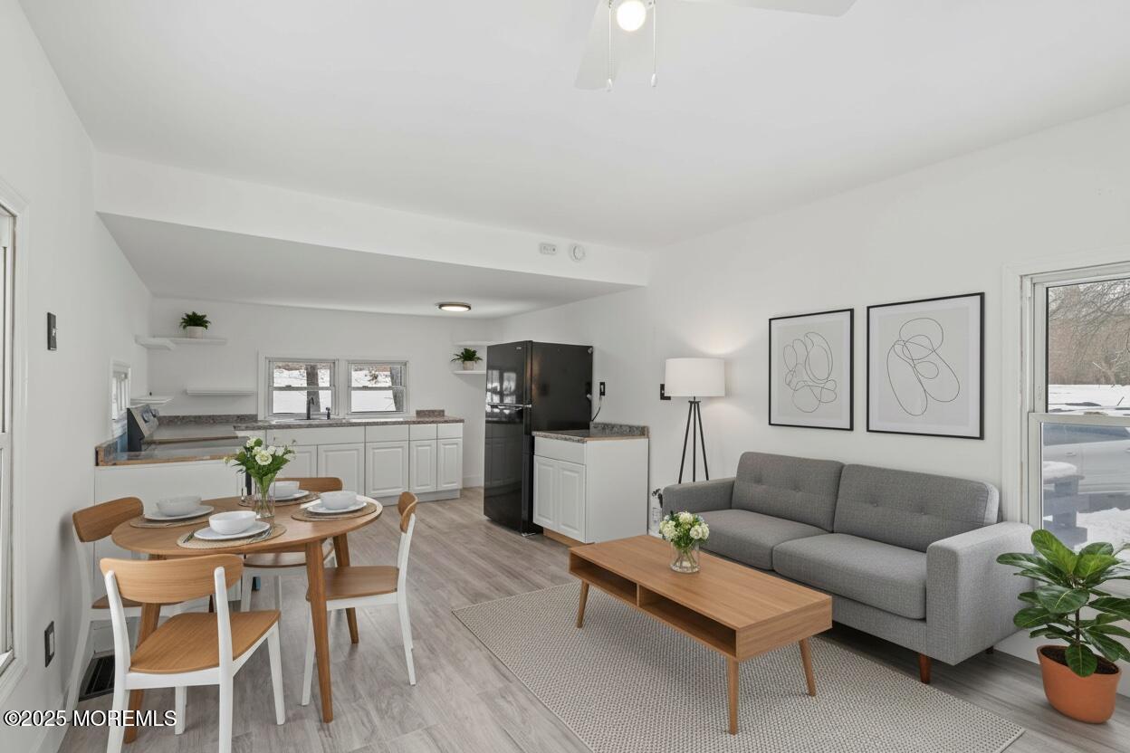 Image 4: Virtually Staged Kitchen/Living Room