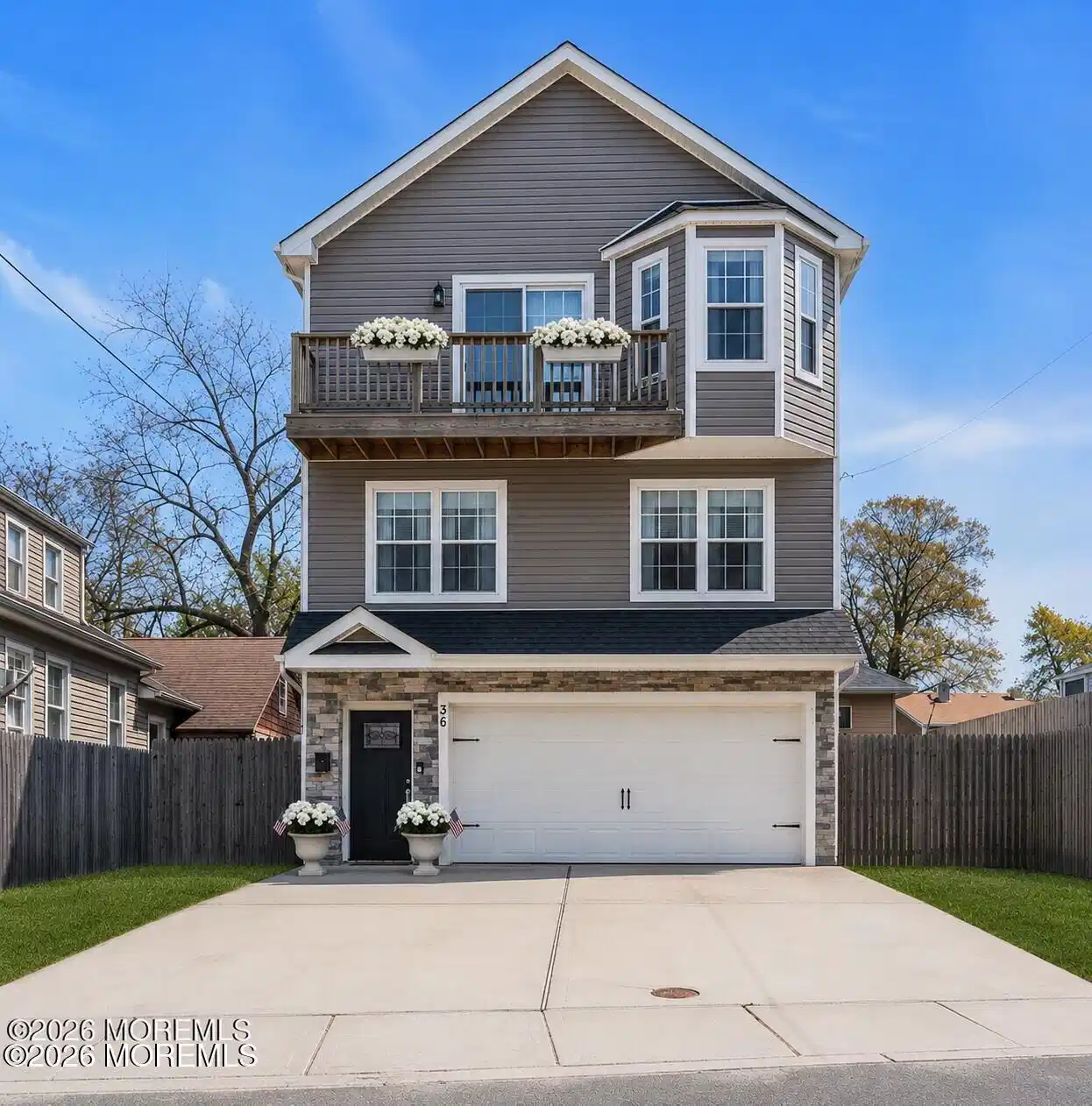 Image 1: new woodside front