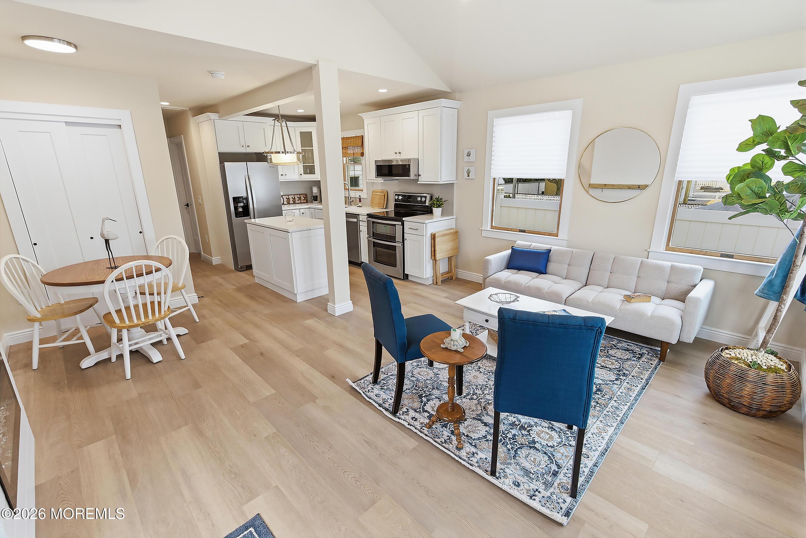 Image 4: Dining Kitchen and Living