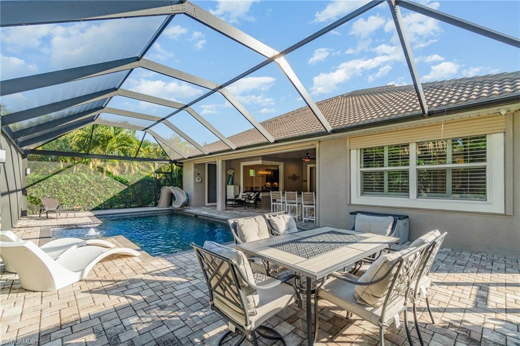 Image 4: Lanai with Entertainment and Dining Area