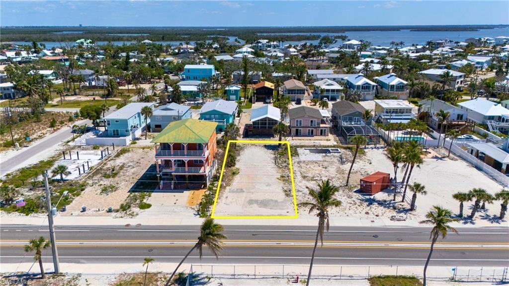 Image 3: Aerial view with a residential view and a water view - VIRTUALLY EDITED EXTERIOR IMAGE