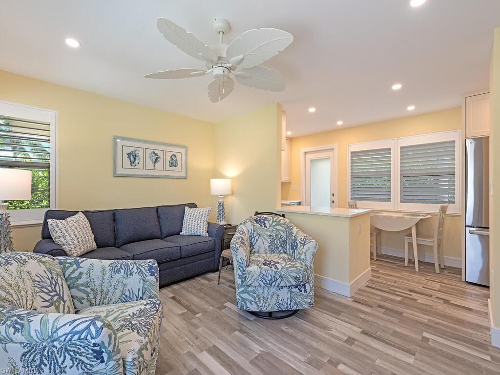 Image 2: Natural light illuminates the home throughout.