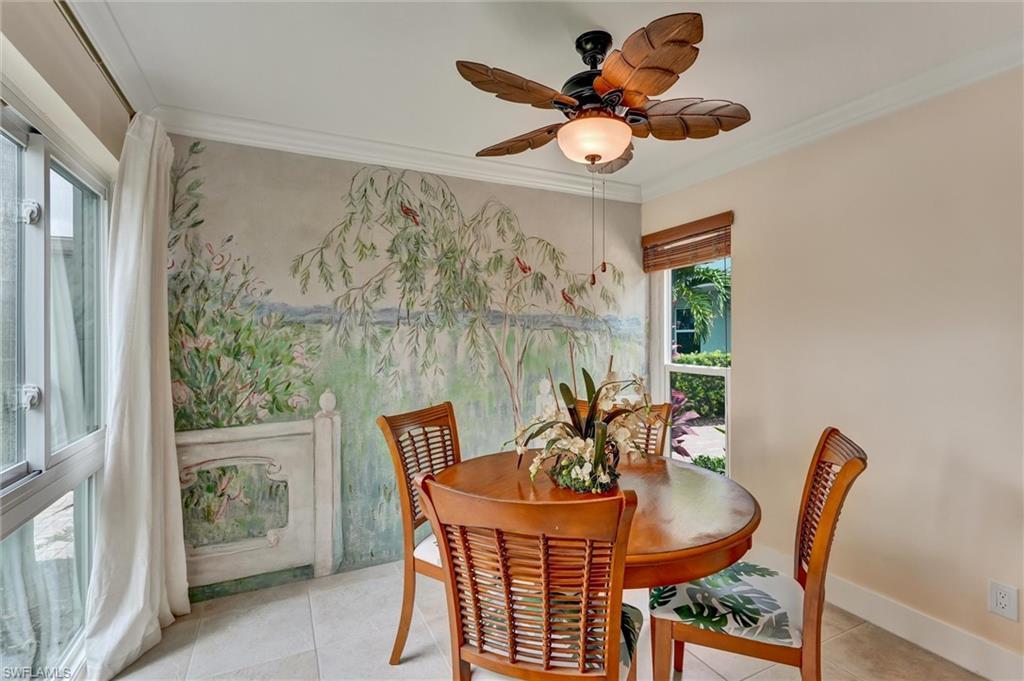 Image 4: Another view of dining area with mural and another window.