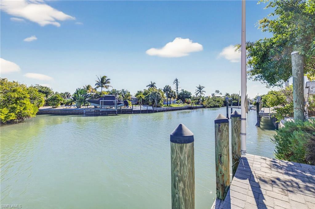 Image 4: Dock area featuring a water view