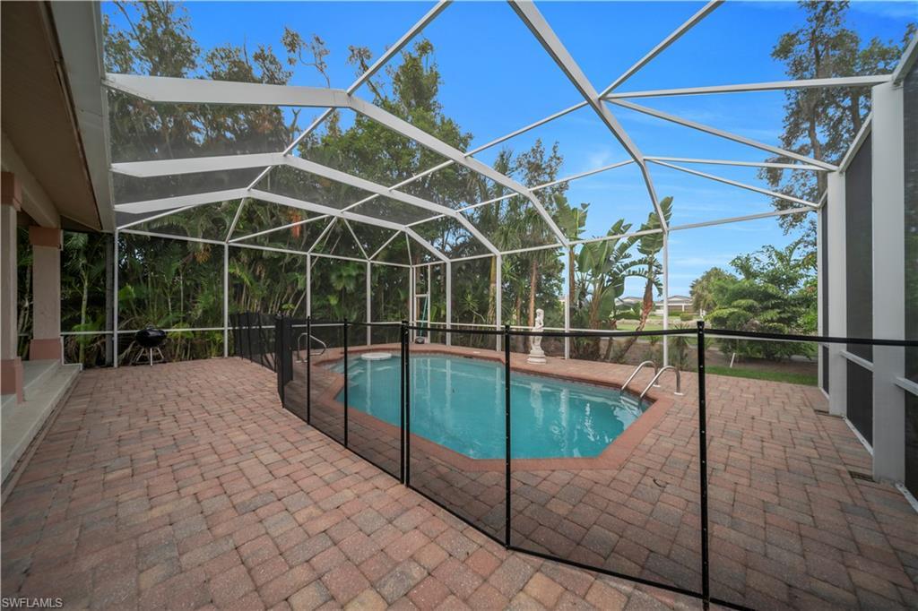 Image 3: Screened in lanai with pool