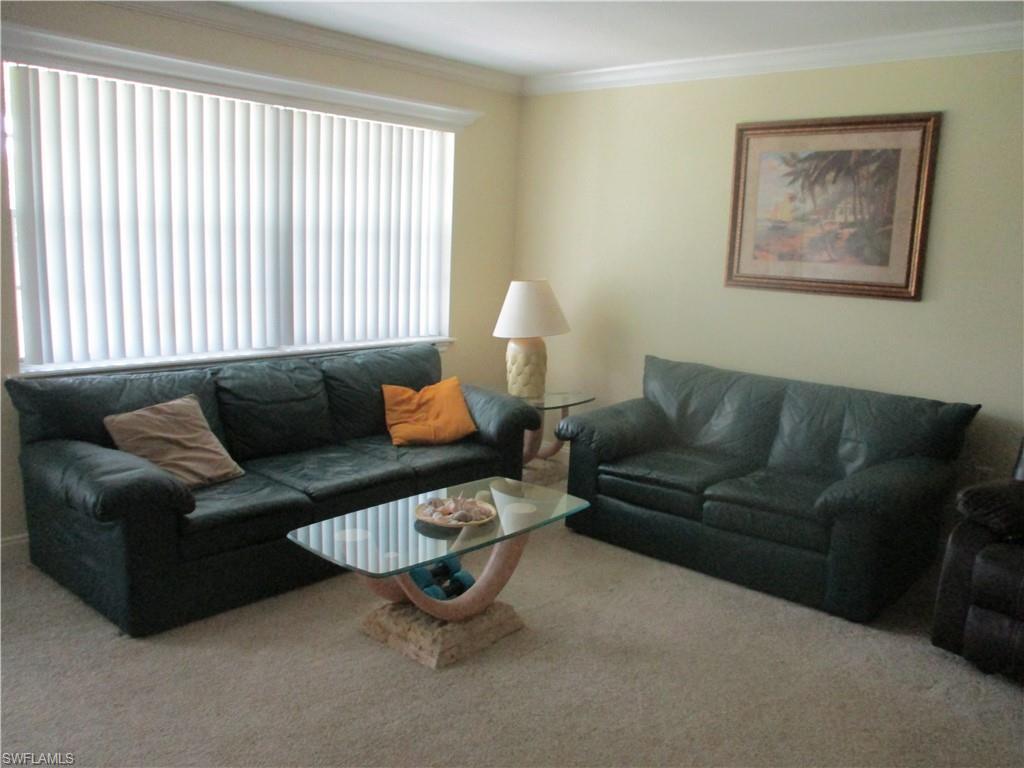 Image 1: Living Room with crown molding and newer carpet