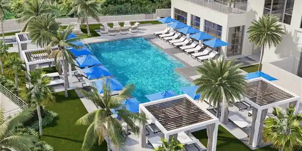 Image 2: View of swimming pool with a pergola and a patio area