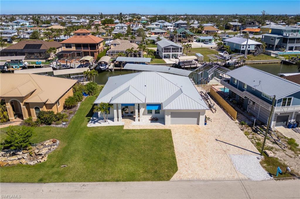 Image 3: Aerial view with a residential view and a water view