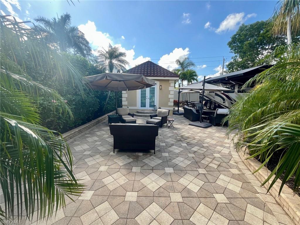 Image 1: View of patio / terrace featuring outdoor lounge area